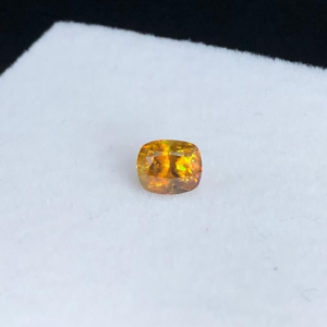 presenting a stunning faceted natural sphene (titanite).