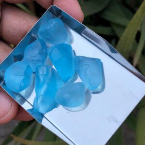 faceted rough natural swiss blue topaz.